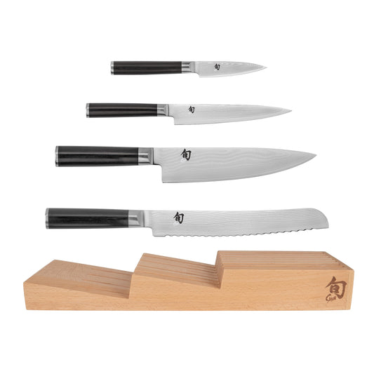 Shun Classic 5-Piece Set: handcrafted Japanese knives, Damascus steel, includes chef, paring, utility, and bread knives.